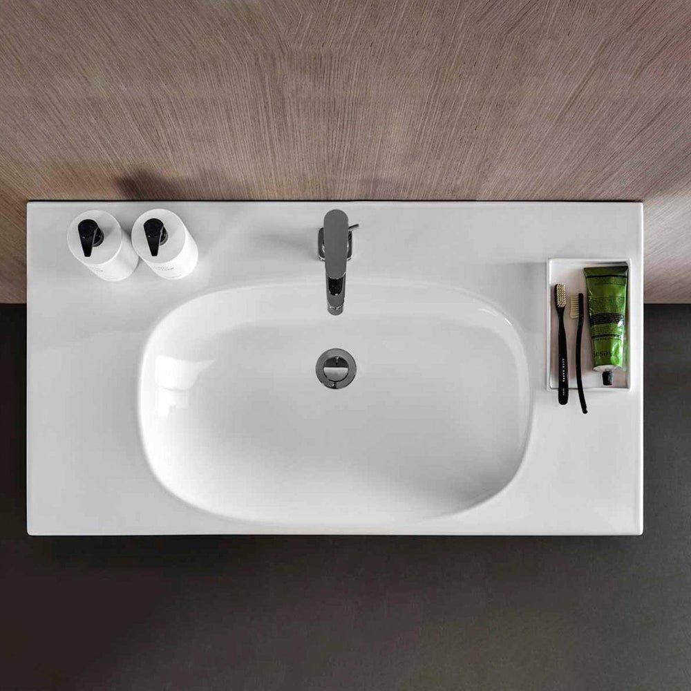Lavabo monoforo Acanto con superficie di appoggio 75 cm — Geberit - HD casa